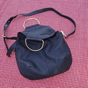 Foly & Corinna Chic Black Pebble Leather Shoulder Bag with Gold Accents
